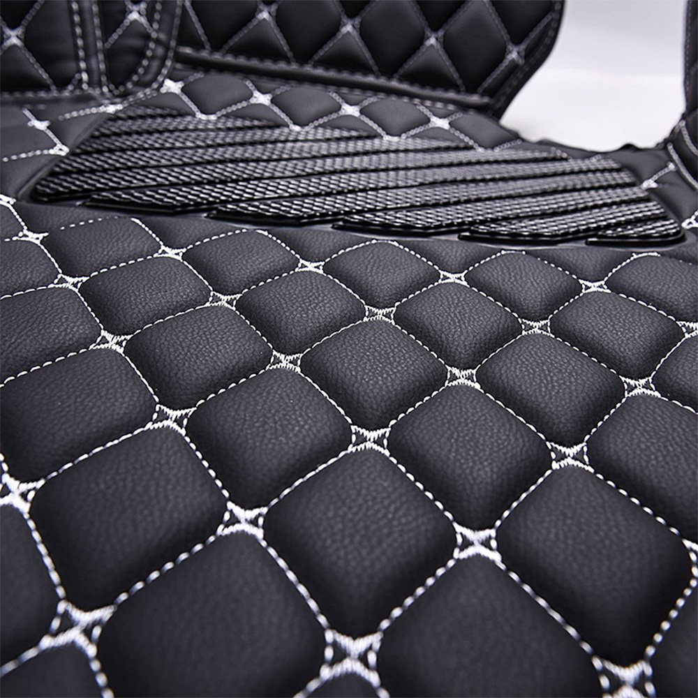 https://indymats.us/wp-content/uploads/2022/10/Black-Leather-and-White-Stitching-Diamond-Car-Mats-Closeup.jpg