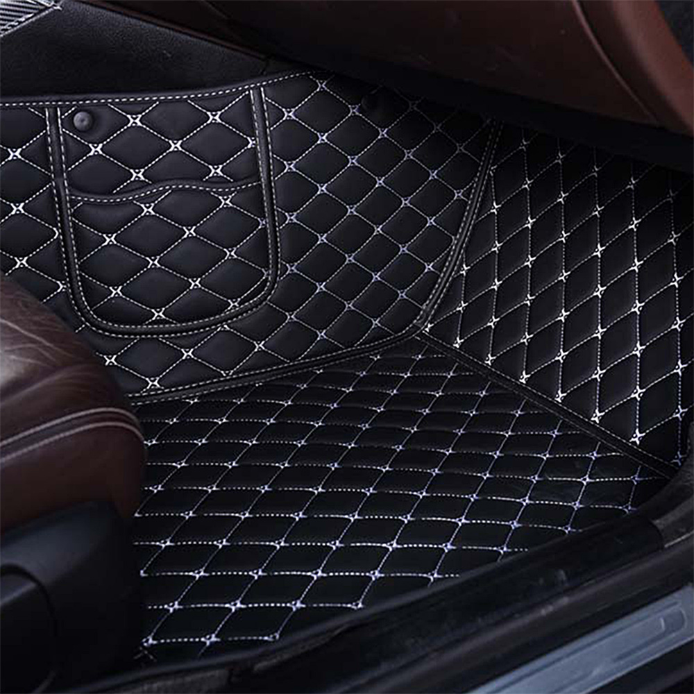 https://indymats.us/wp-content/uploads/2022/10/Black-Leather-and-White-Stitching-Diamond-Car-Mats-Passenger-Side.jpg